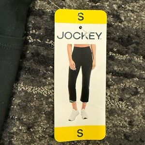 Jockey workout pants with flared leg and slit. Size small NWT
